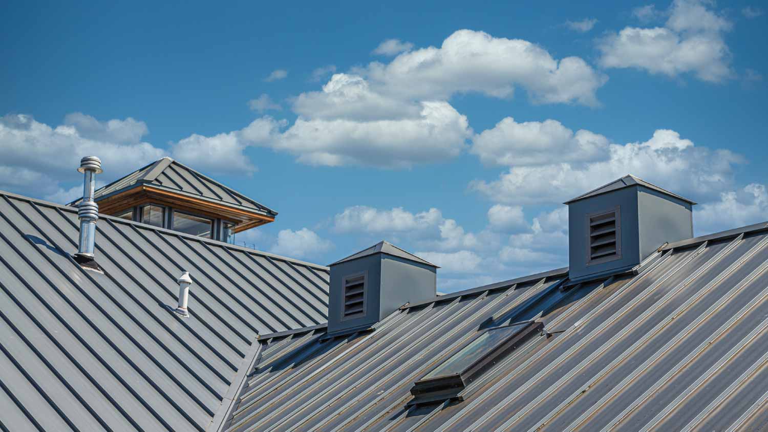 Metal roof under blue sky