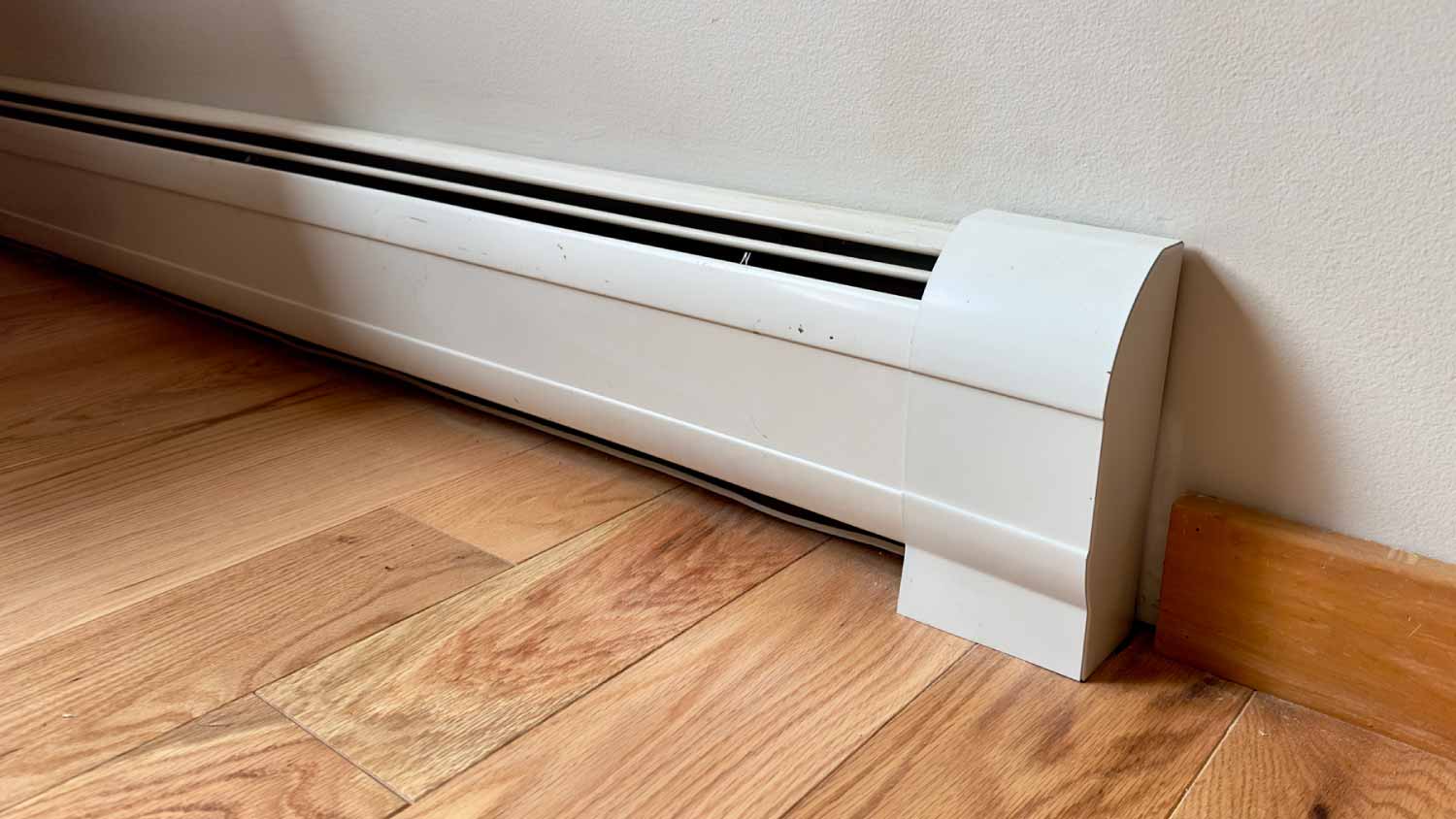 White baseboard heater
