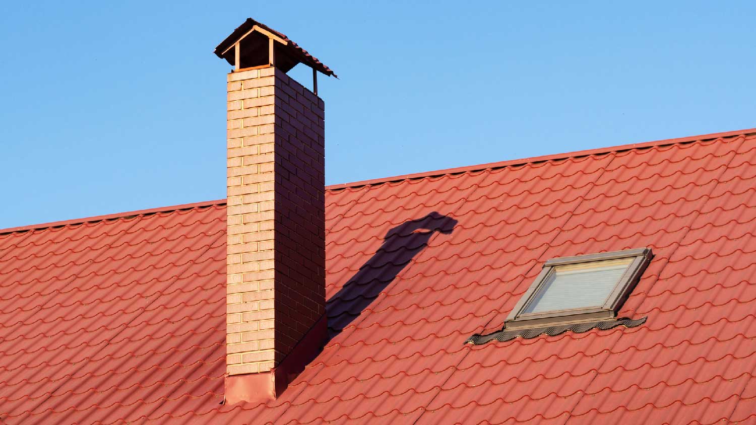 A brick chimney on a roof
