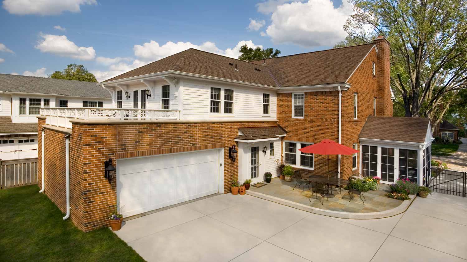 Yard of traditional brick home