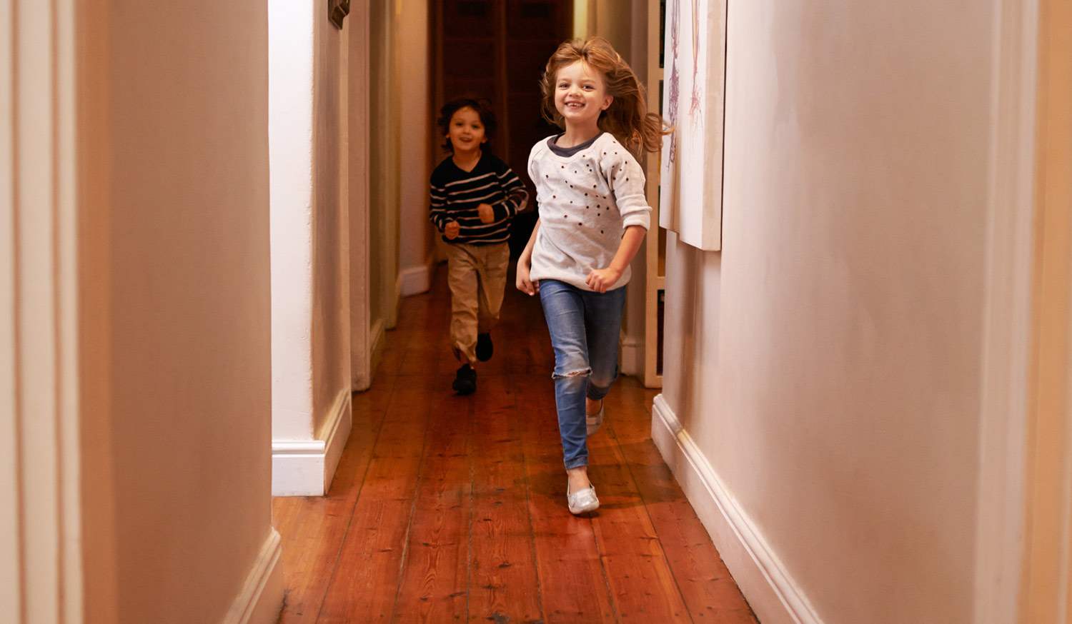 Kids running down hardwood floors