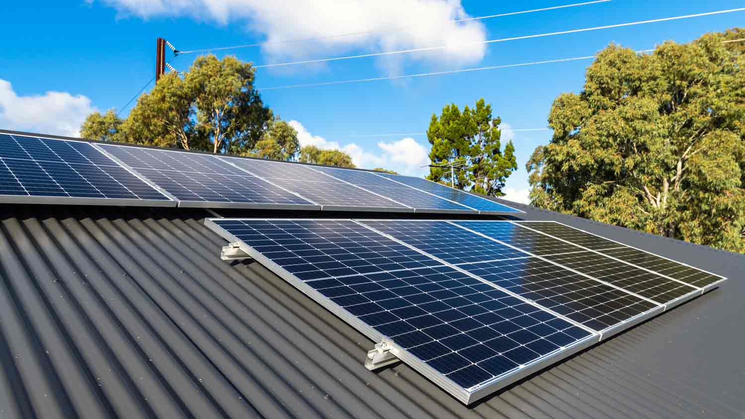 roof with solar panels on sunny day