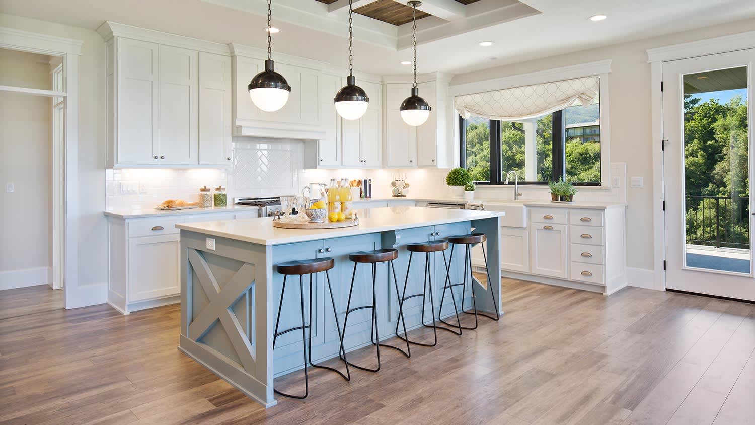 White kitchen with blue island