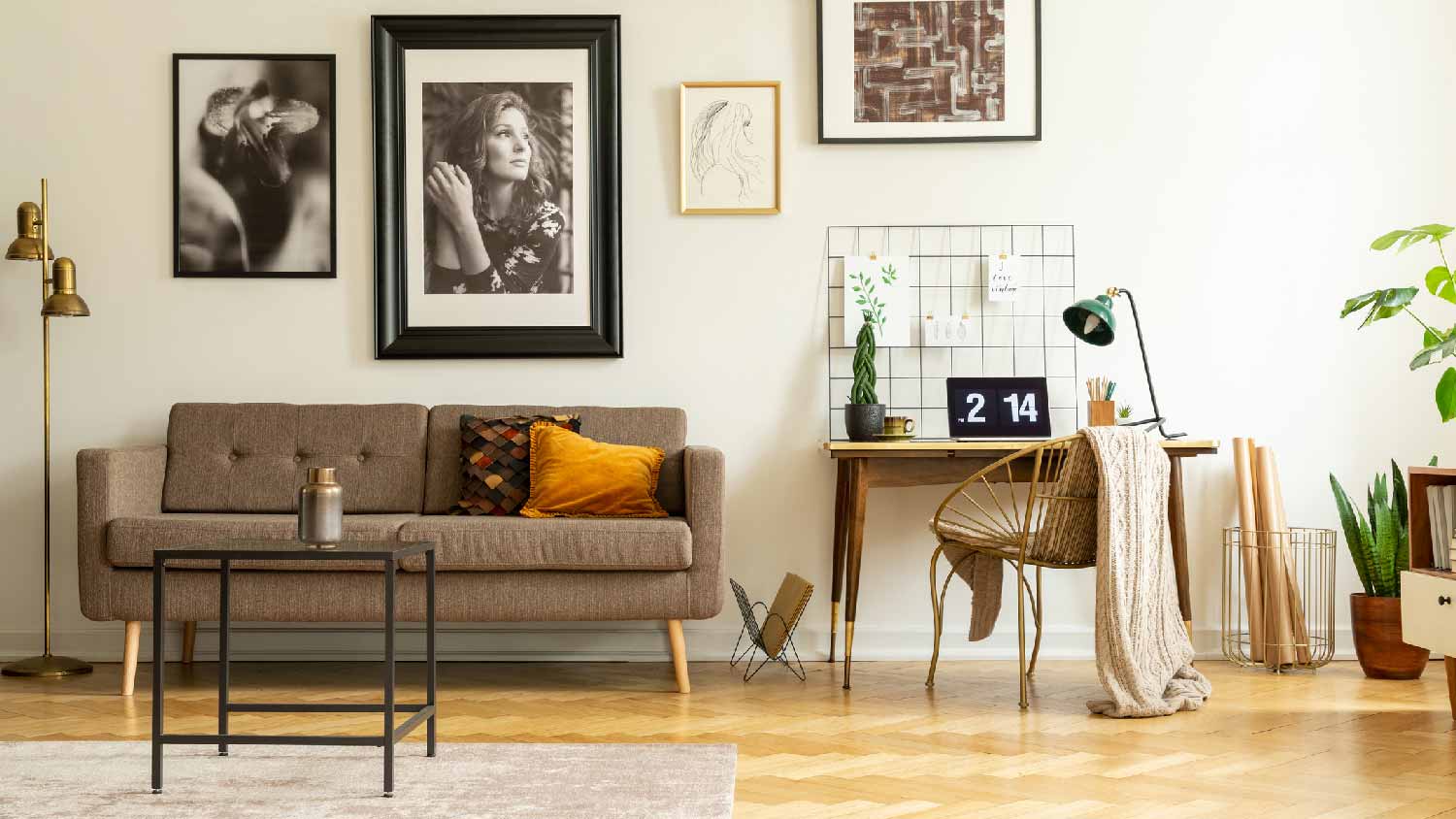 A living room with pictures on wall