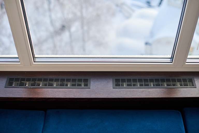 baseboard heaters below windows