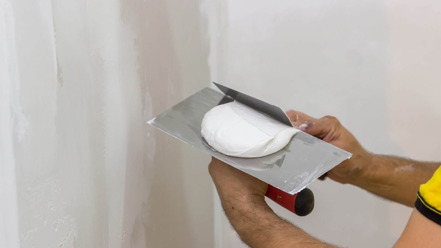 Close-up of spackle on a spatula