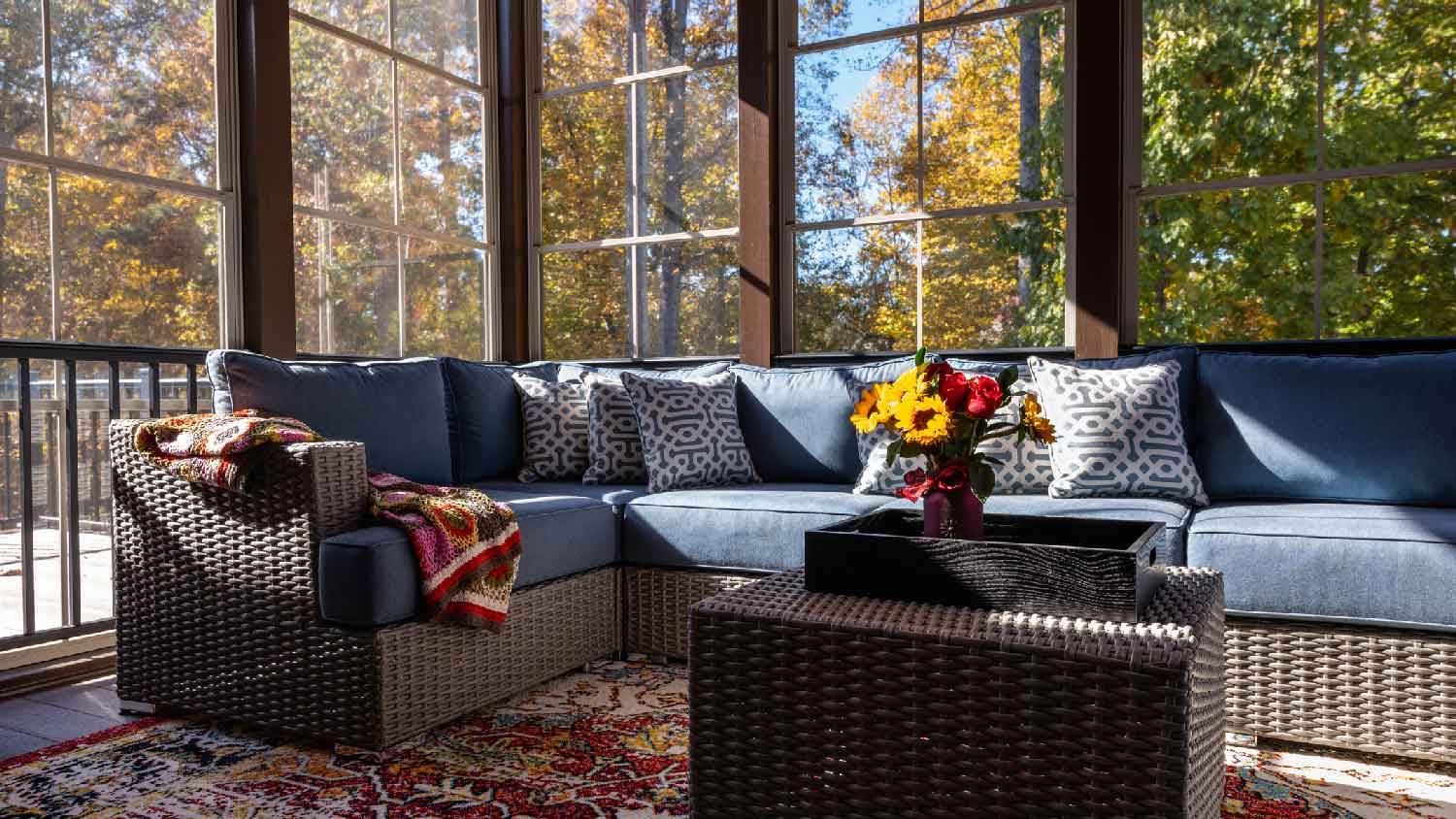 The interior of a screened-in porch