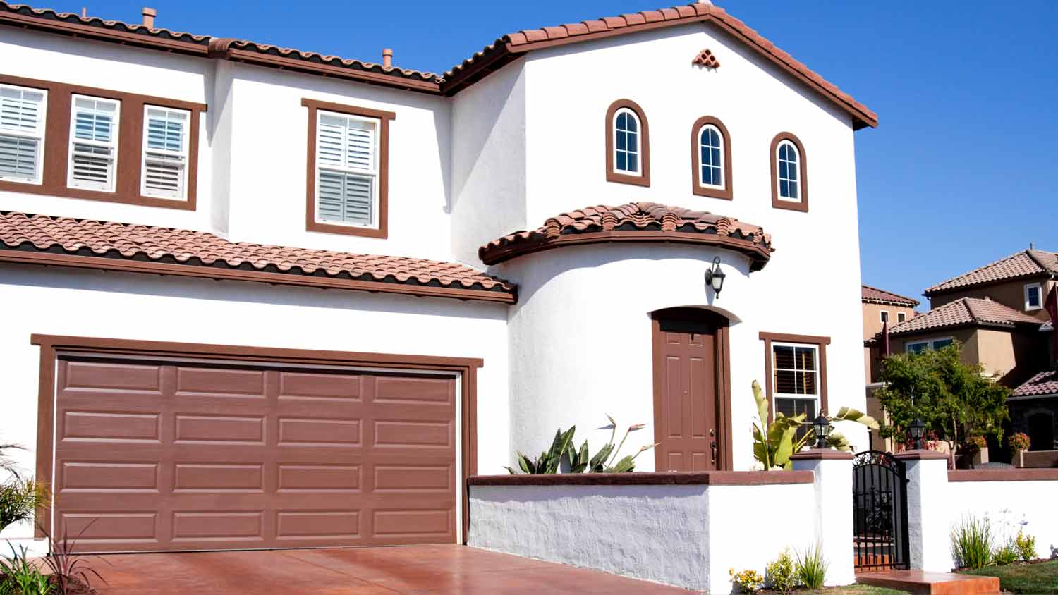 white and brown stucco house