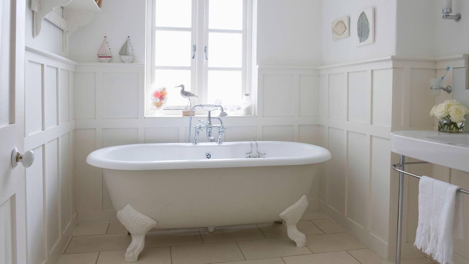 Bright bathroom with wall panels and bathtub