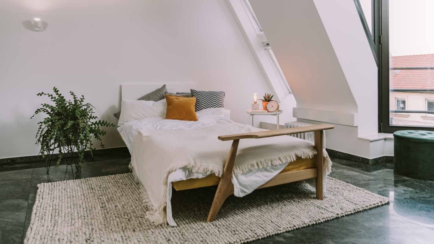 Interior of bedroom in loft apartment