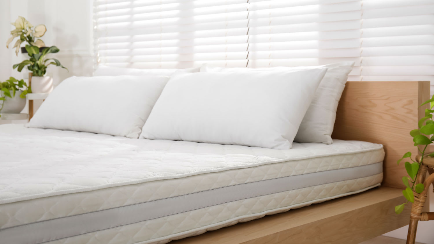 wooden bed with new mattress