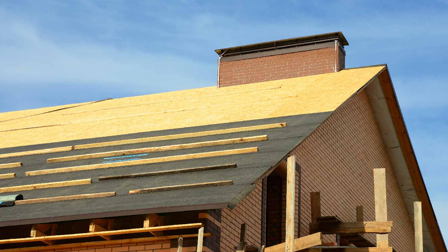 A roofing underlayment on a house construction site