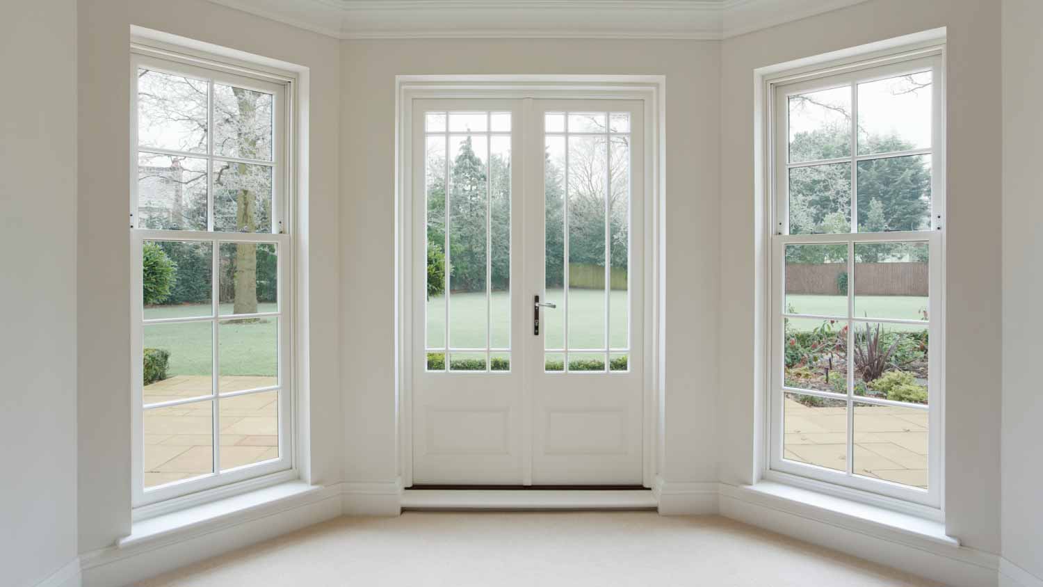 White bay windows and French doors