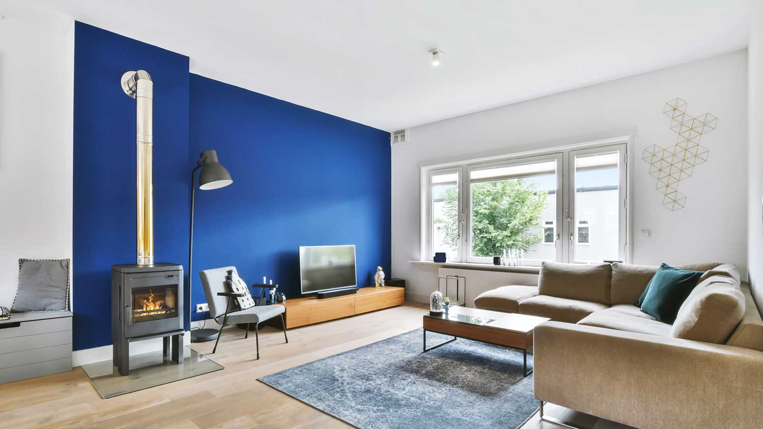 Modern living room with blue accent wall