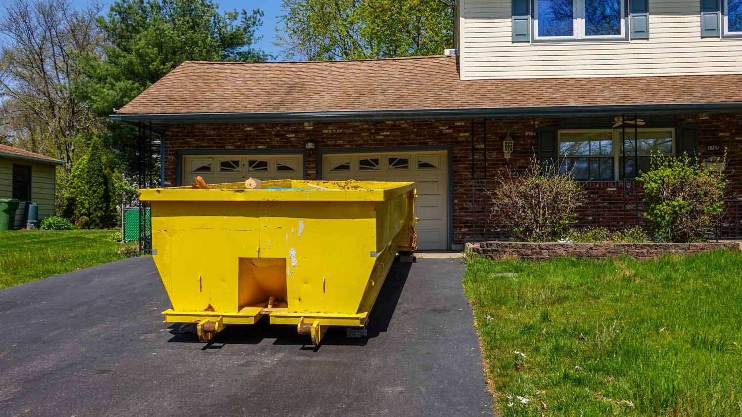 Yellow empty dumpster