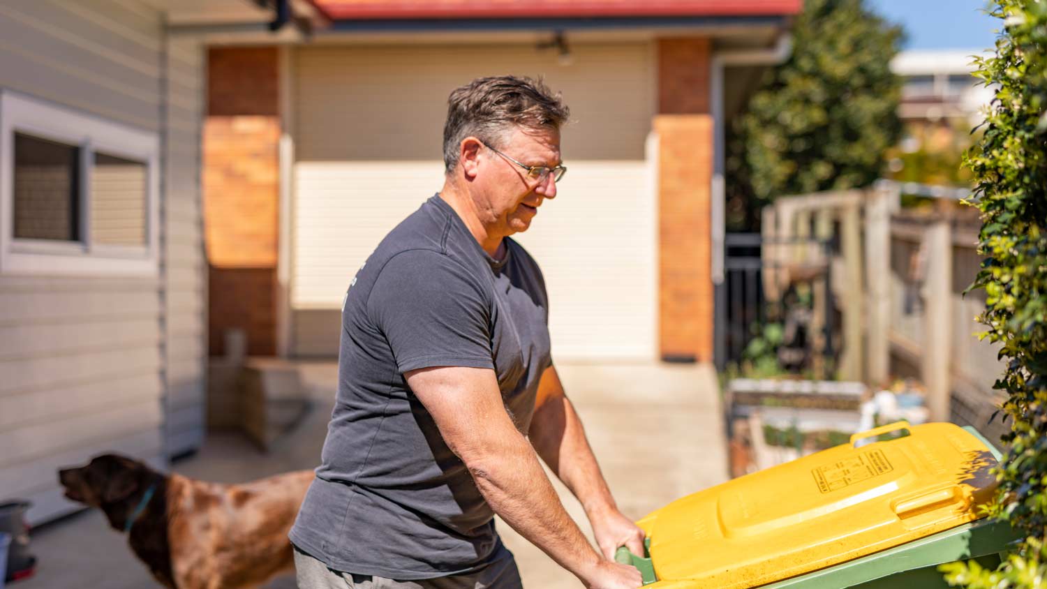 man taking out trash