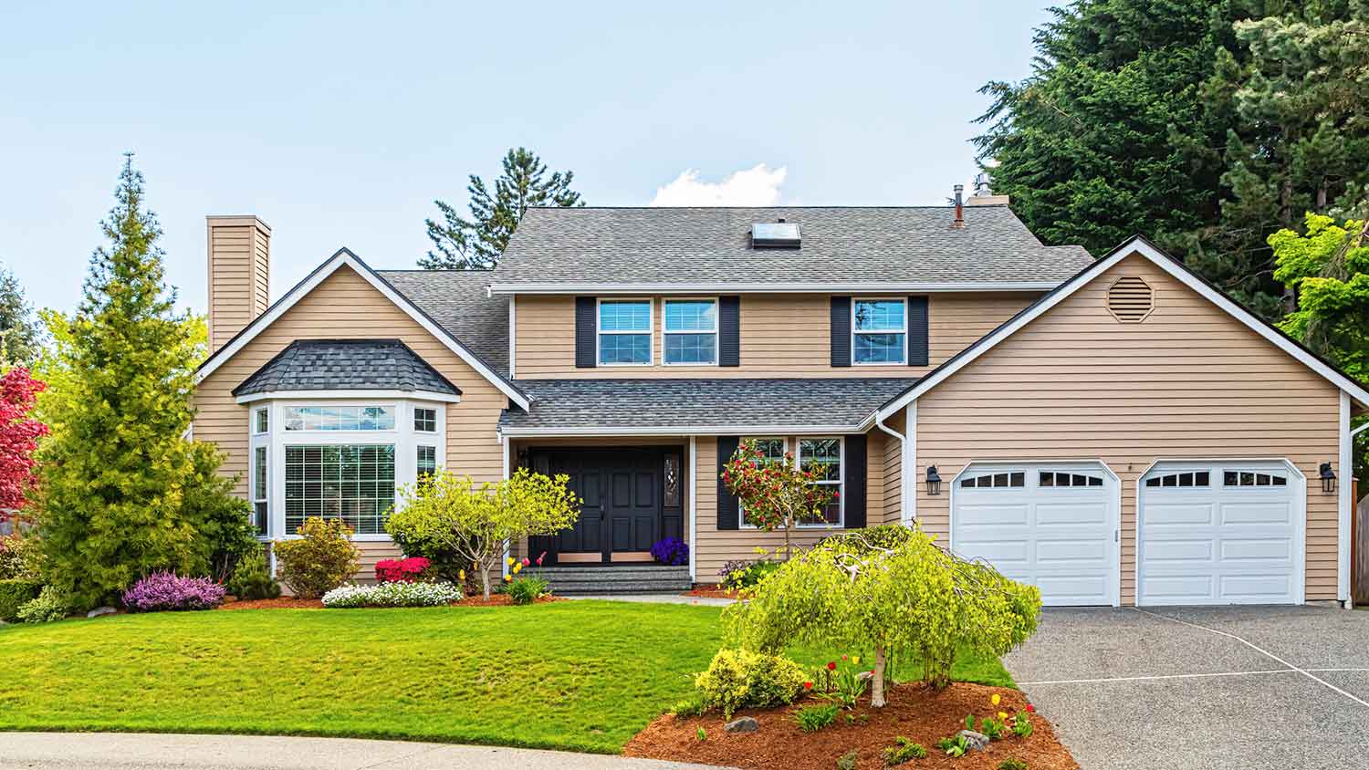 Suburban house with composite shingle roof