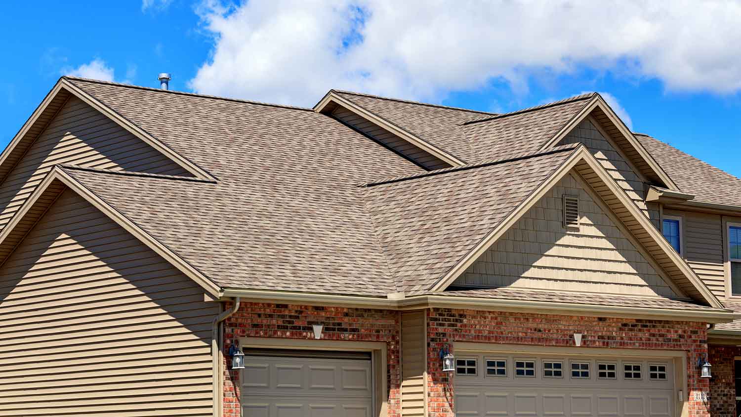 The roof of a brick house