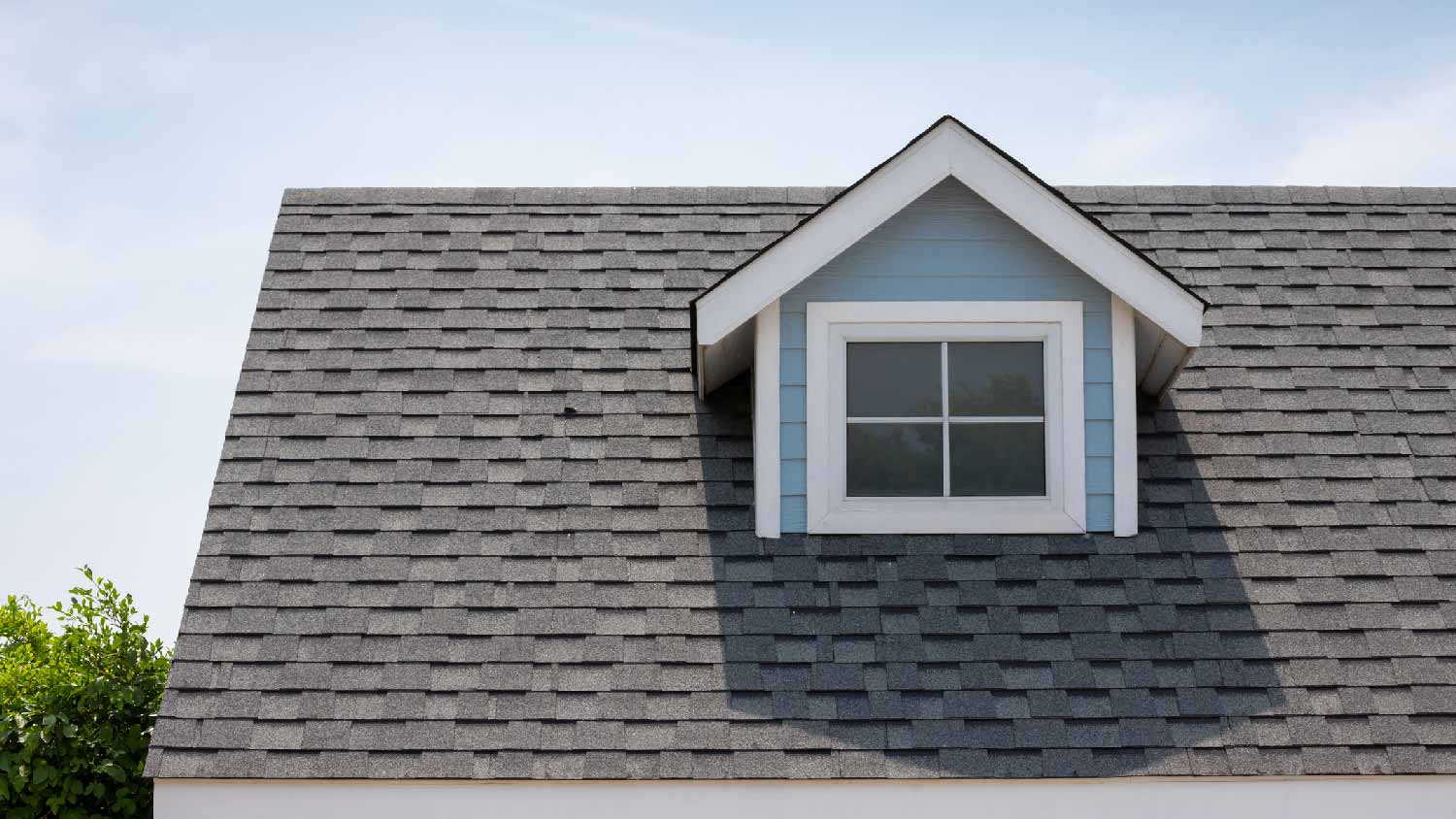 A roof with a garret and rubber shingles