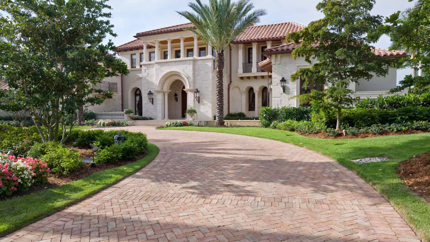 House with a paver driveway