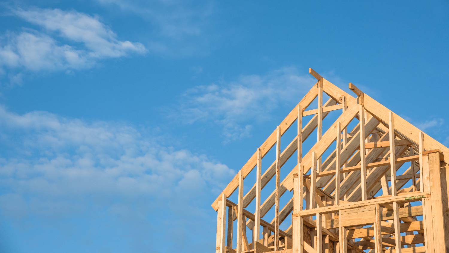 A roof truss on a construction on a bright day