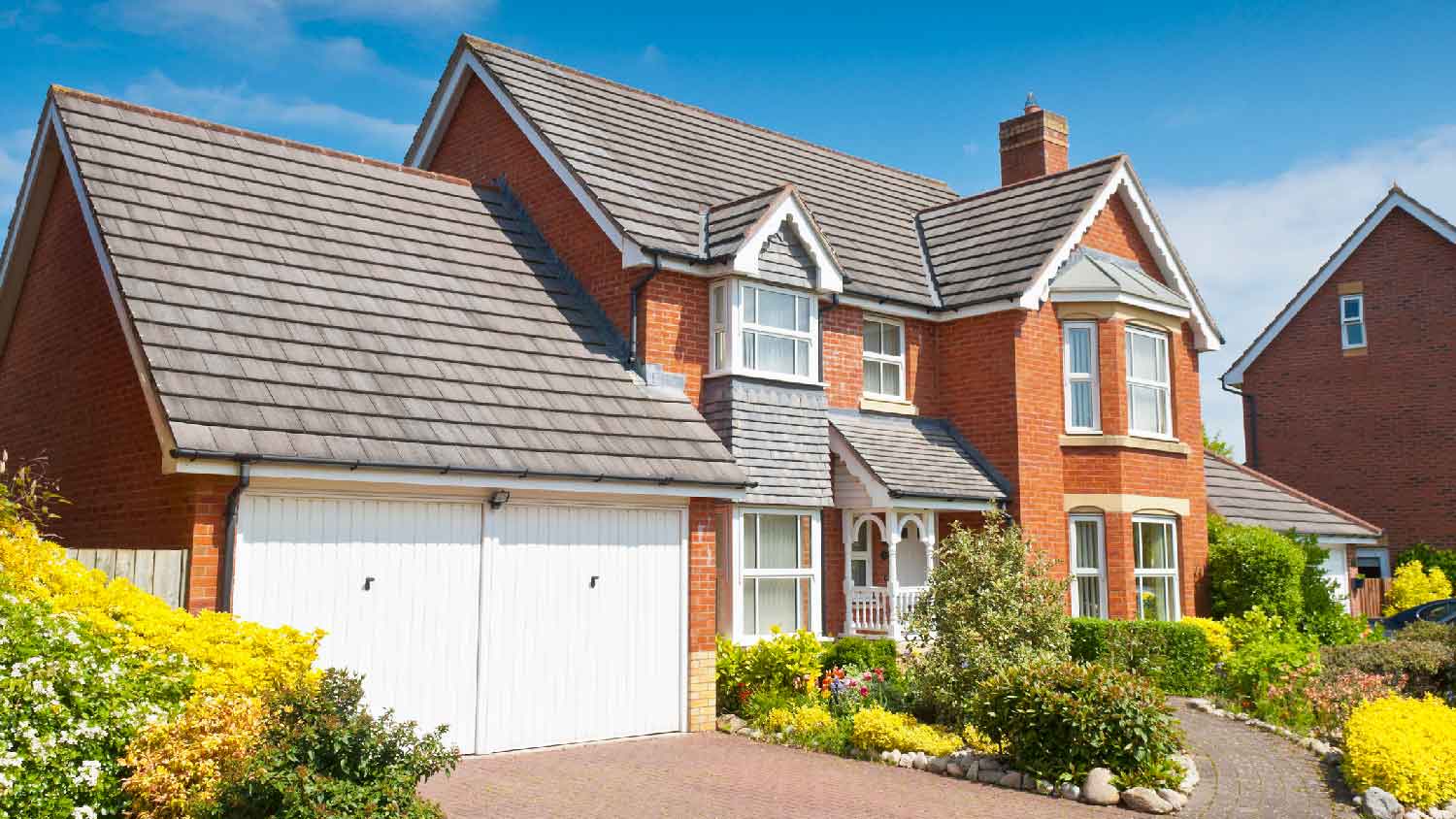 The exterior of a beautiful red brick house