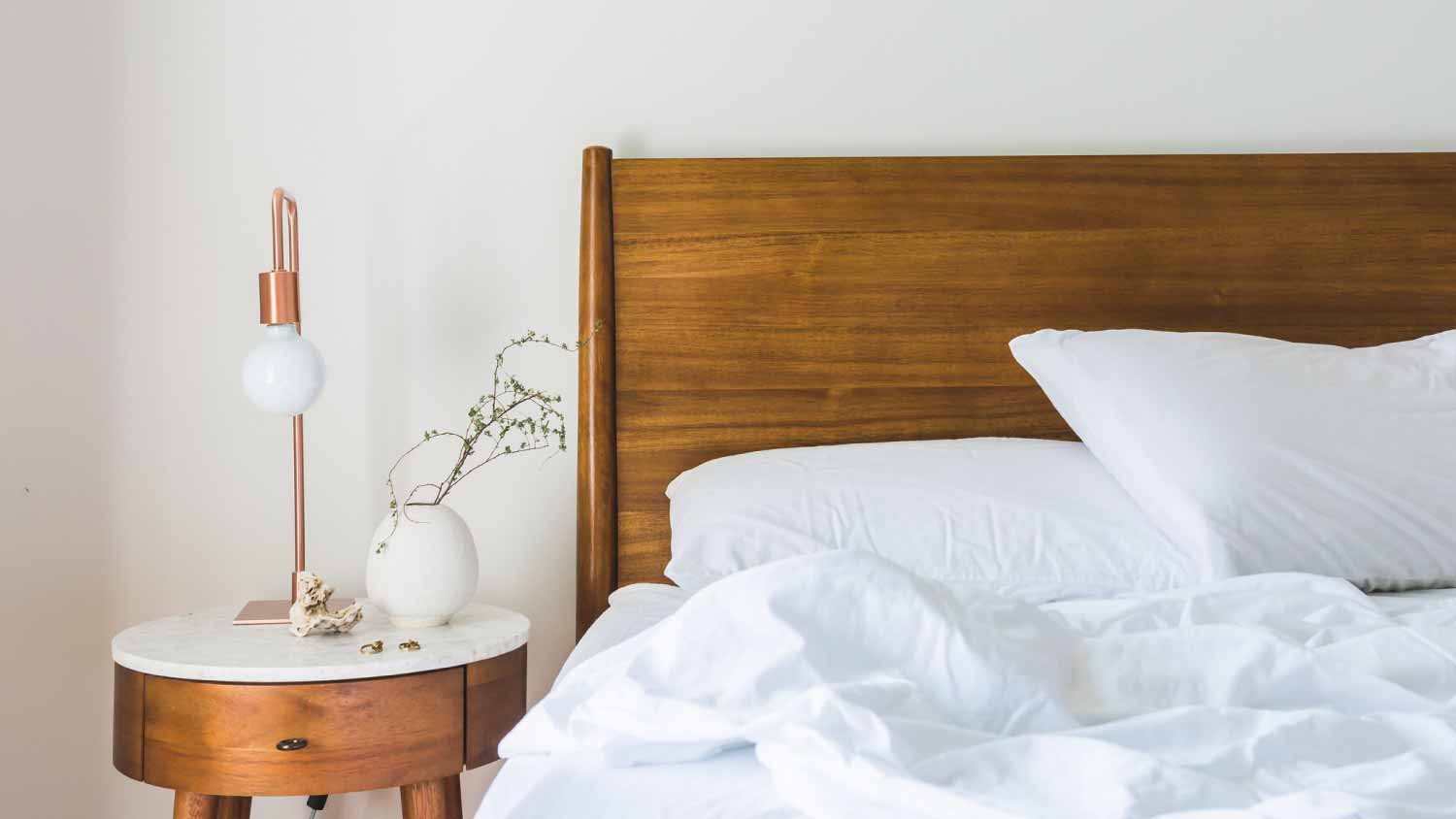 Empty white bed