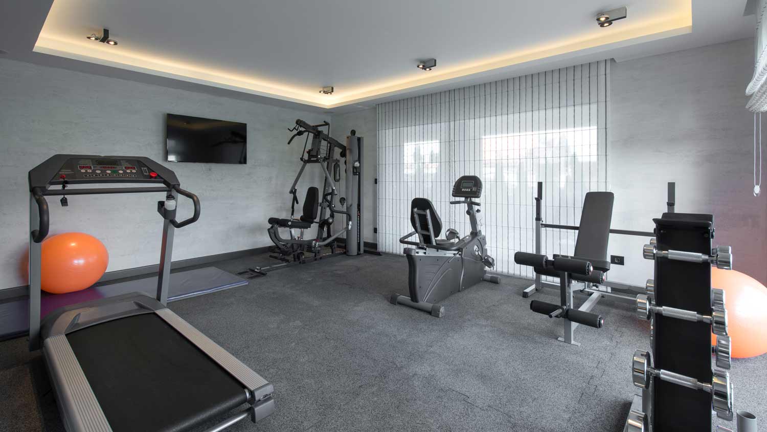 home gym with rubber tile floor