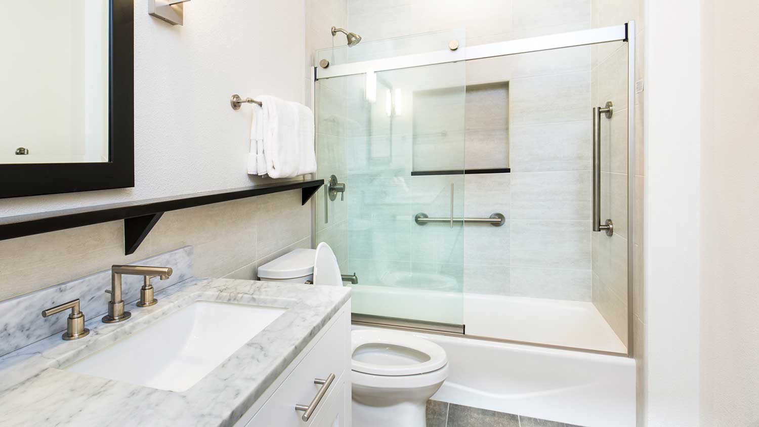 Modern bathroom with shower grab bars