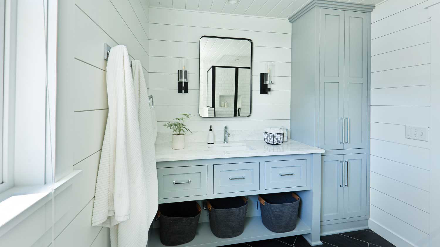 Modern farmhouse bathroom with gray vanity