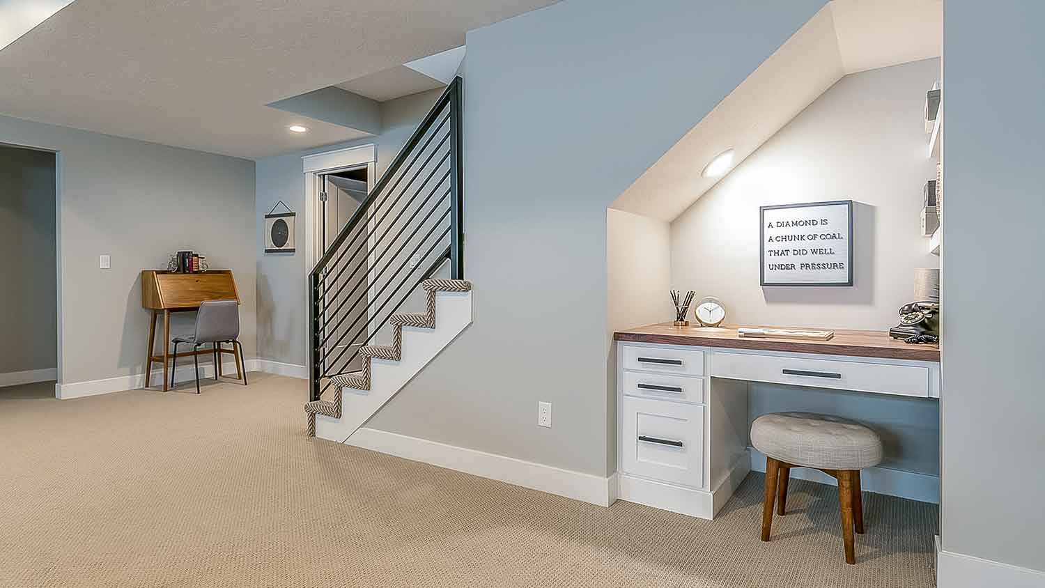 Basement room with office desk