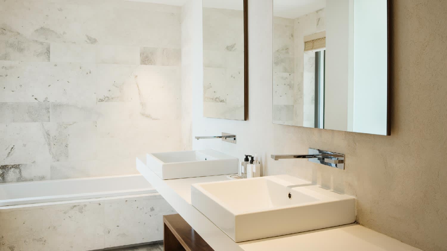 A bathroom with a double sink