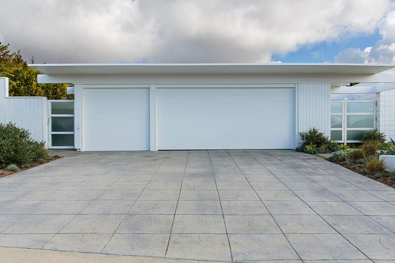 Concrete driveway for three car garage