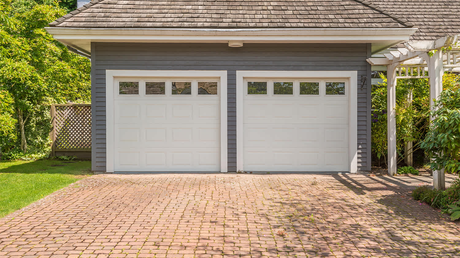 grey and white garage driveway