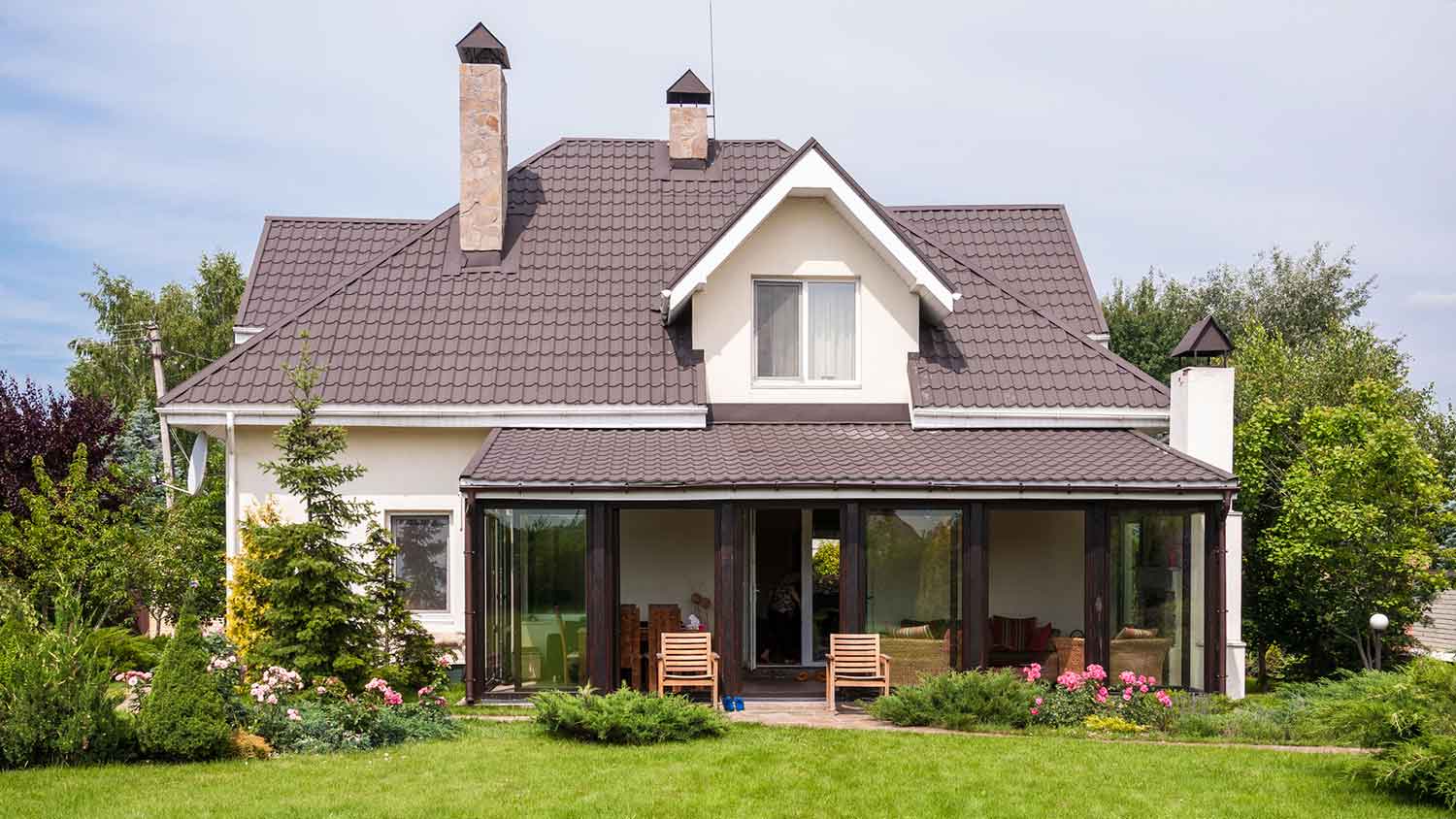 Country house with a metal shingle roof