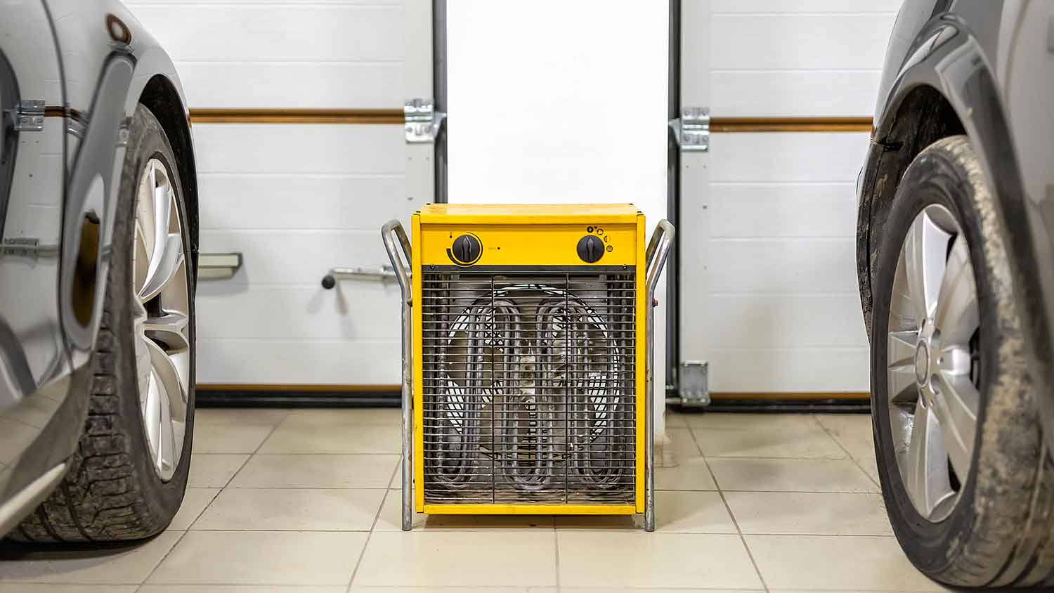 Electric garage heater sitting on the floor