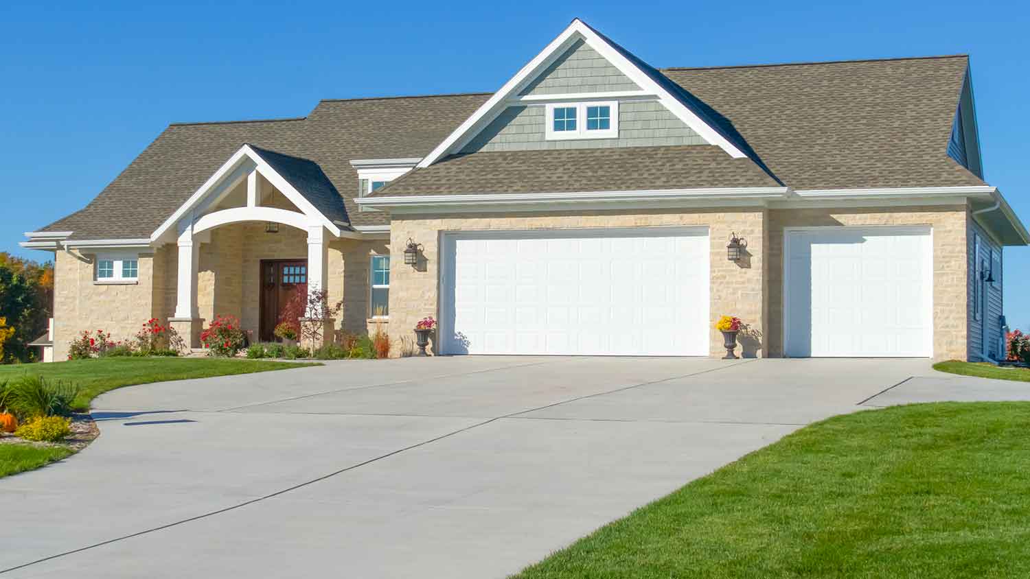Country house with large concrete driveway