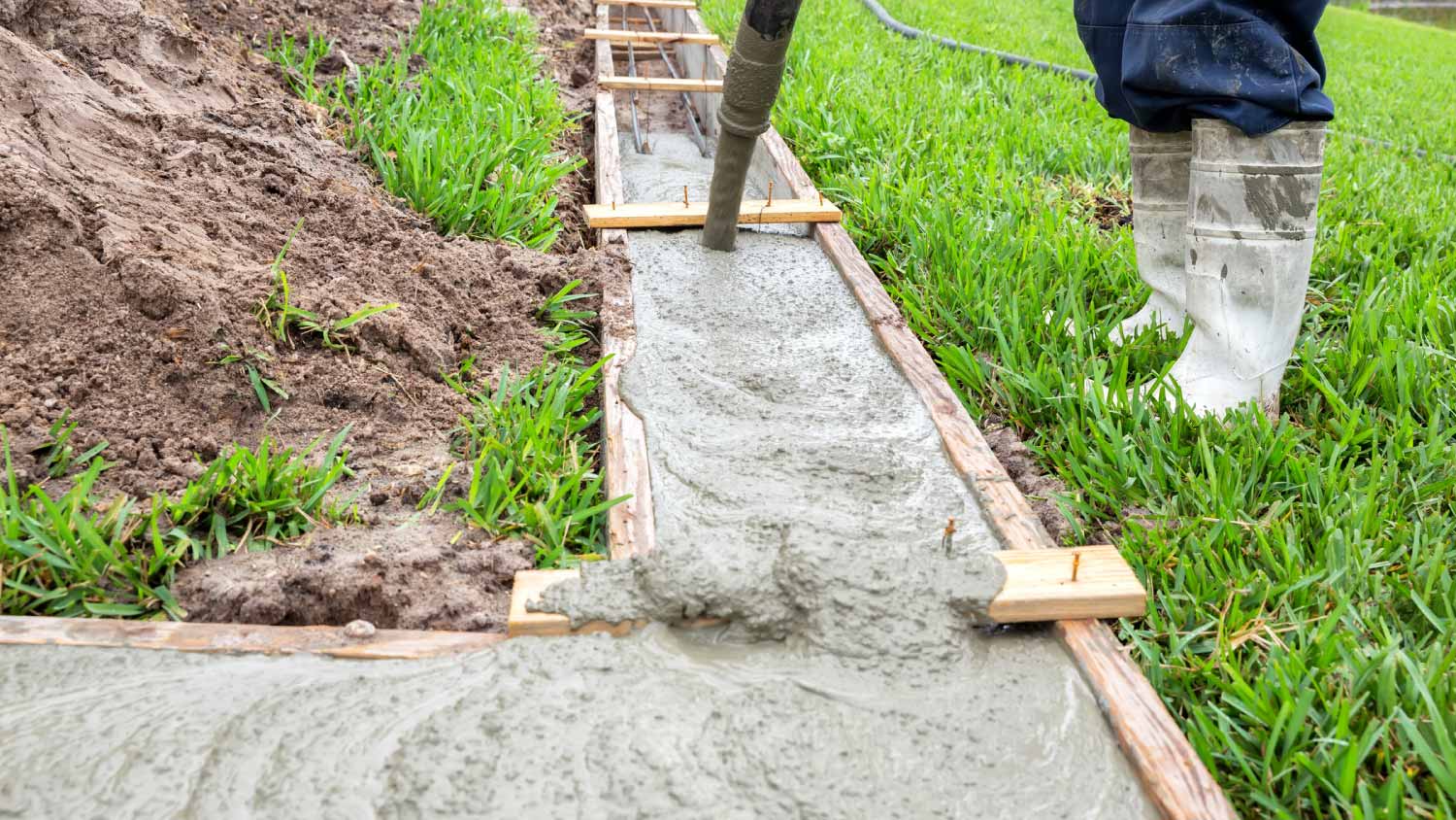 Concrete pouring at construction site