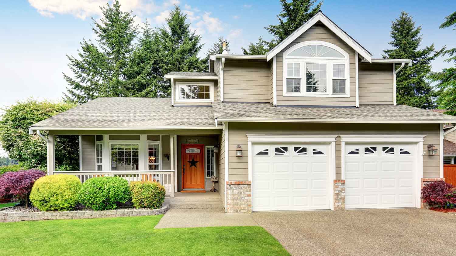 Aluminum rain gutters installed on a suburban house