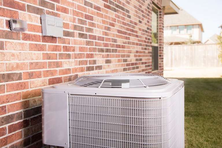 Air conditioner unit outside house