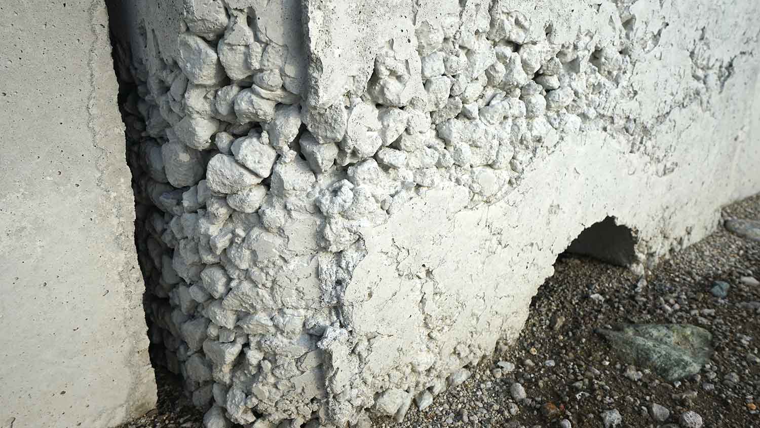 Concrete wall showing segregation of concrete