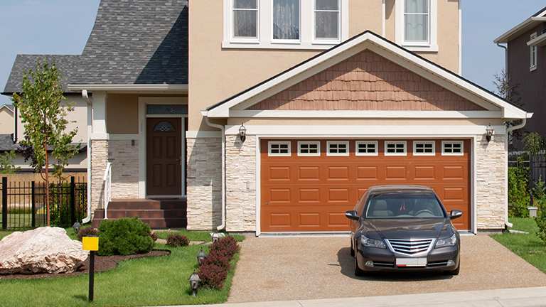 Car in front of garage