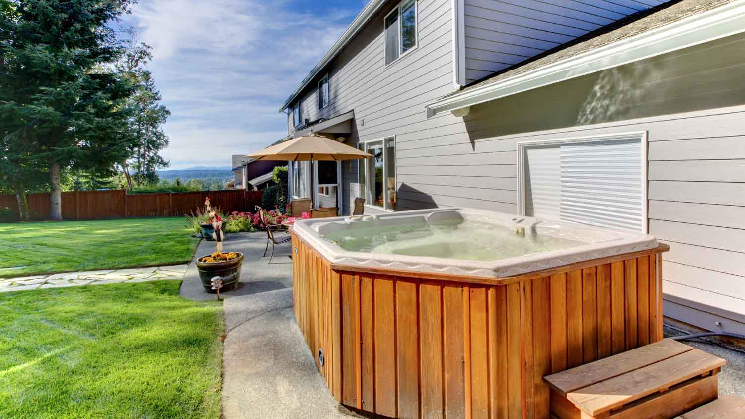 backyard with large hot tub