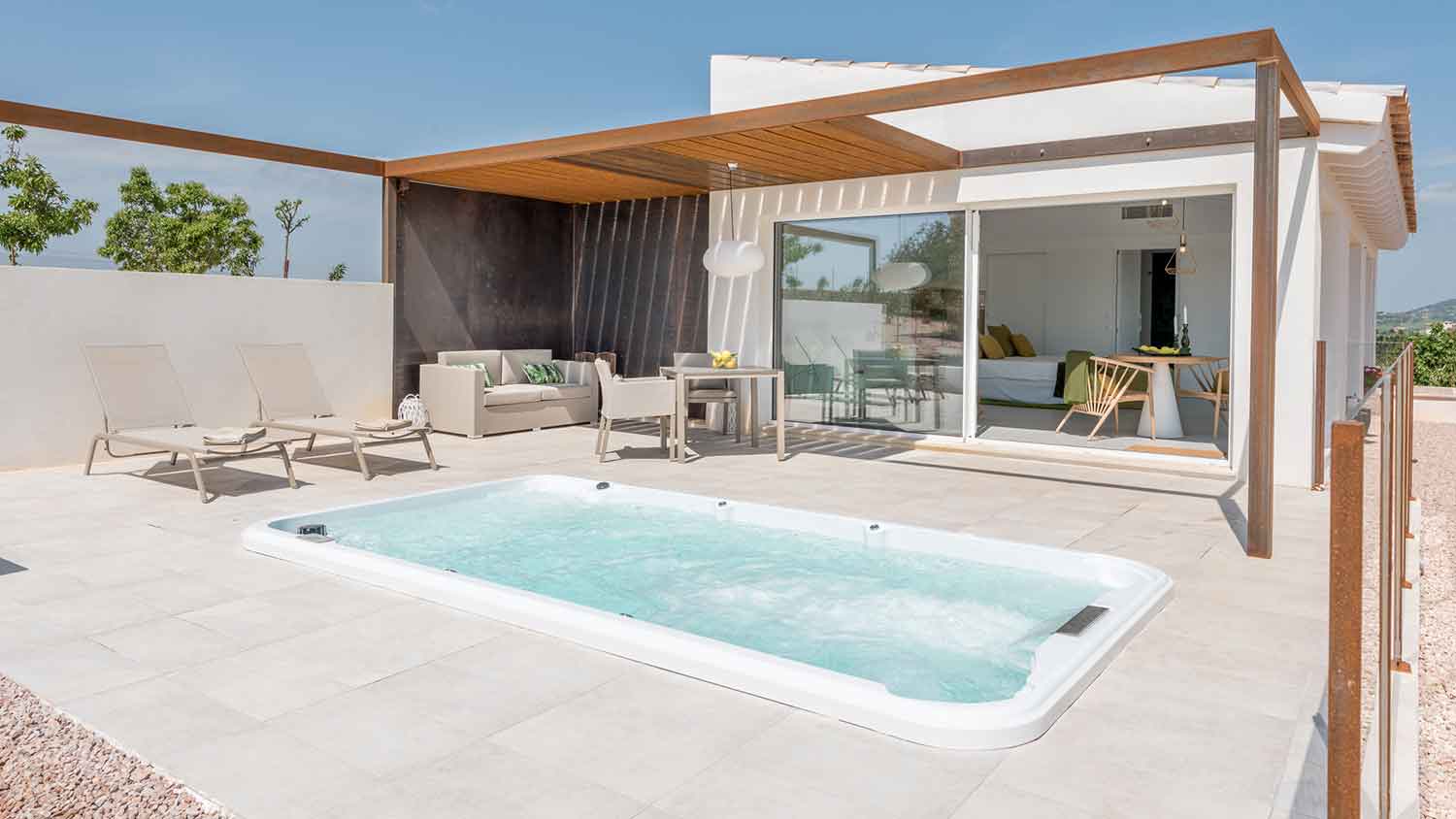 Swim spa installed on a modern patio