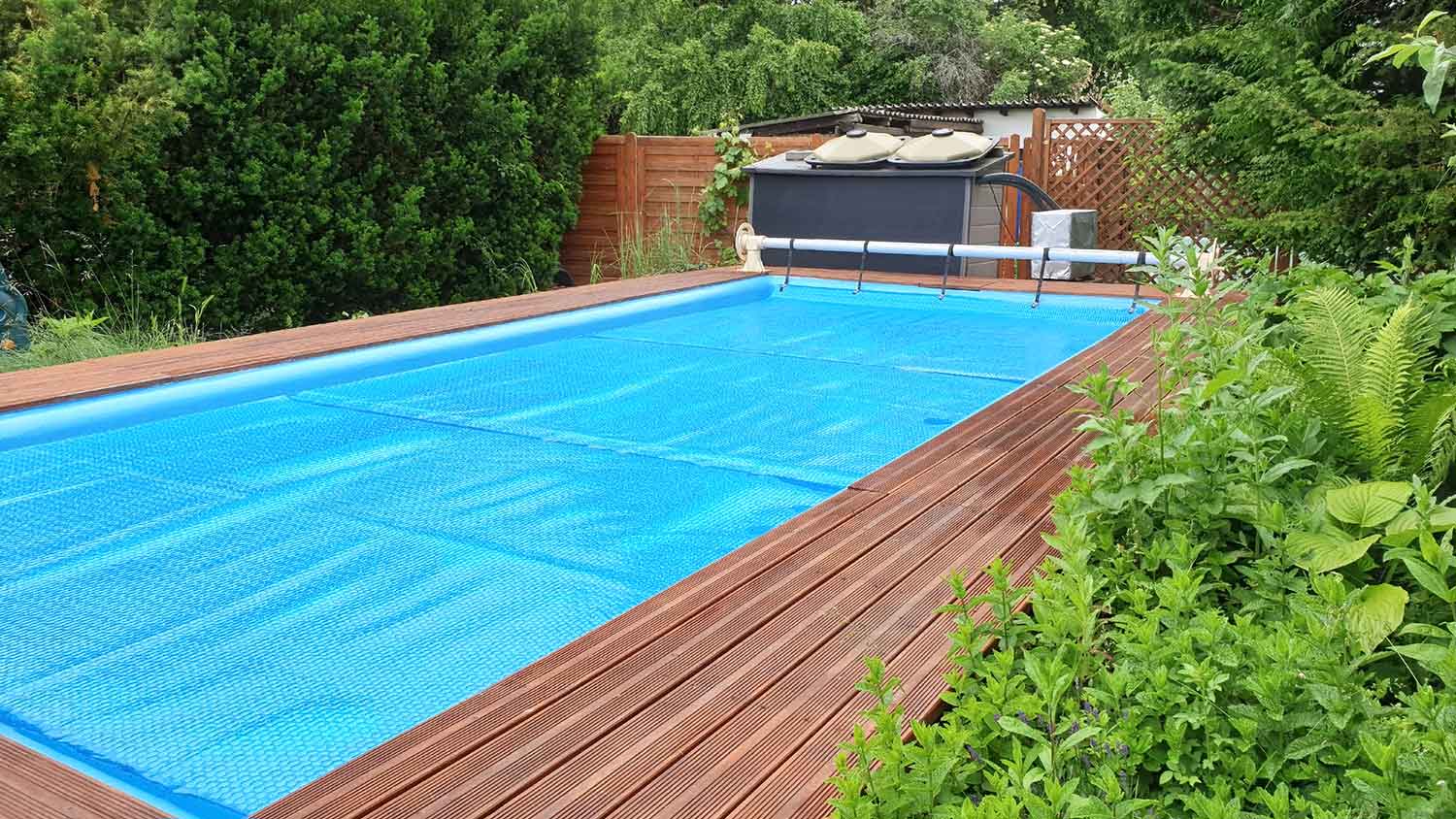 Swimming pool with protective cover on