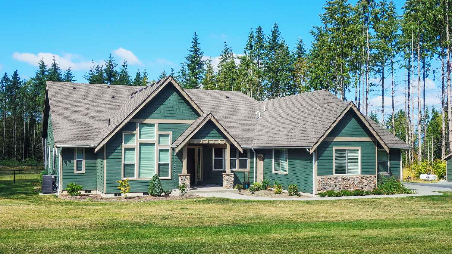 The exterior of a house with a large yard