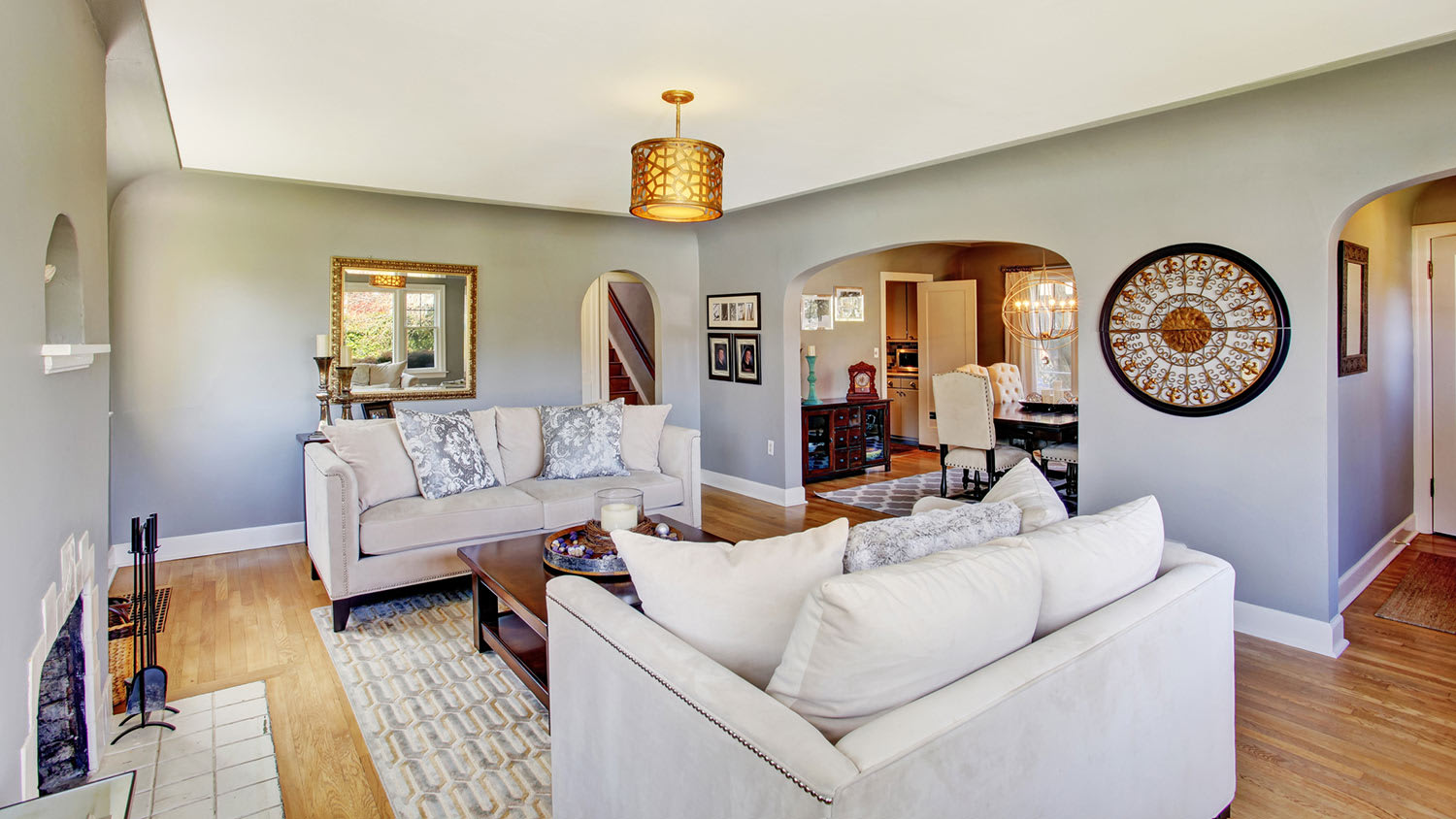 An old home with plaster walls painted a light grey
