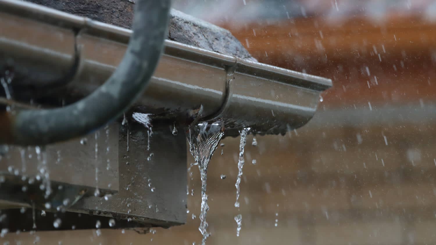 leaky gutter in the rain