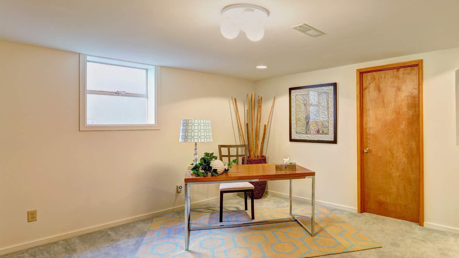 Basement office with a window