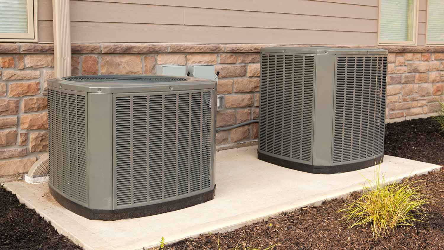 Outdoor HVAC units on a concrete slab